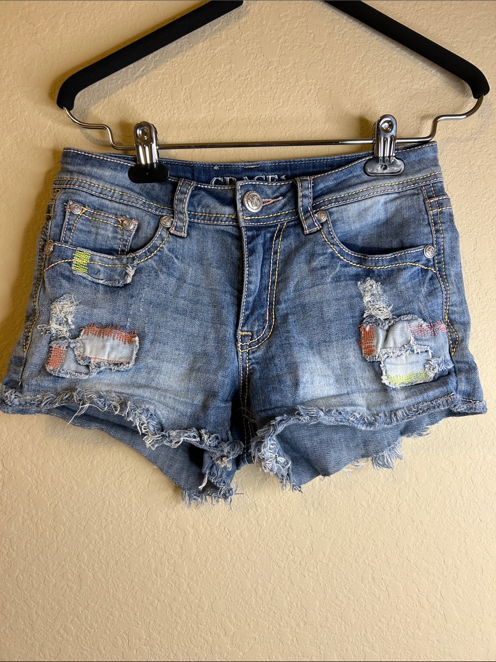 Grace in LA Distressed Light Blue Denim Shorts with Neon Patch Accents Size 26